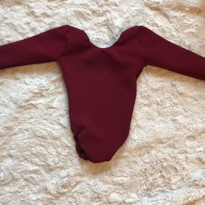 Maroon leotard with pink bow